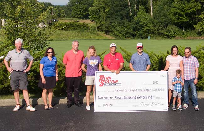 Check presentation to the National Down Syndrome Adoption Network at the PS Golf Outing